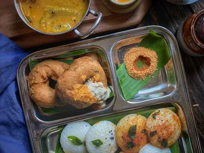 Steamed idlis with chutney and sambar